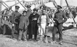 open a larger version of this image Canadian soldiers and local fishers